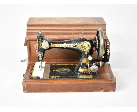 A Vintage Cased Manual Singer Sewing Machine 