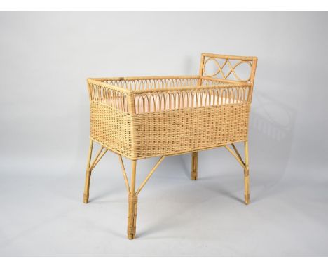 A Mid 20th Century Wicker Cot, 80cms by 47cms 