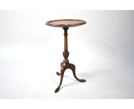 A Mid 20th Century Mahogany Circular Tripod Wine Table, 28cm Diameter and 49cms High 