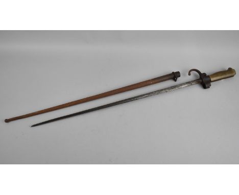 A French 1886 Model Lebel Bayonet, Cruciform Section Blade, Brass Grip and Steel Scabbard 
