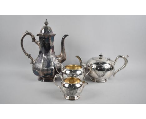 A Silver Plated Britannia Metal Three Piece Tea Service together with a Coffee Pot by James Dixon 