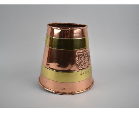 A Copper and Brass Planter inscribed with the Arms of Jersey, 20cms High 