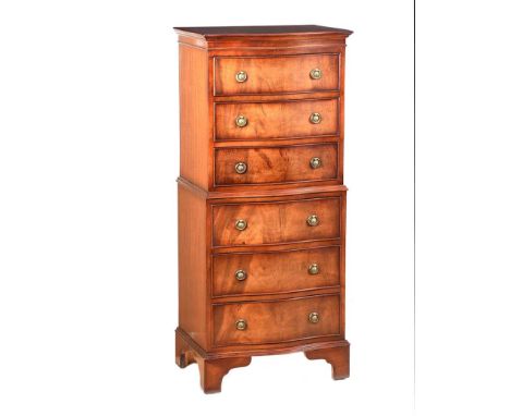 MAHOGANY SERPENTINE FRONT SIX DRAWER CHEST WITH BRASS DROP HANDLES.RAISED ON BRACKET FEET.HEIGHT: 50 INCHES.WIDTH: 21½ INCHES