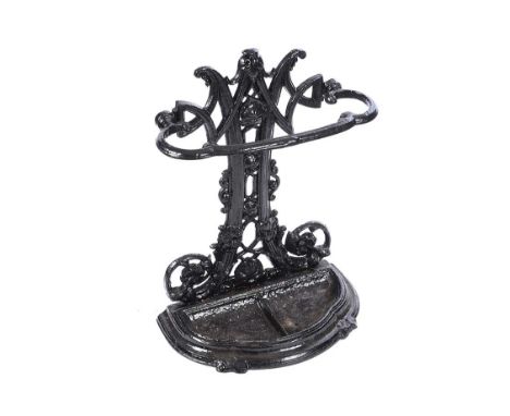 VICTORIAN CAST IRON STICK STAND. RAISED ON A SHAPED BASE.HEIGHT: 23 INCHES.WIDTH: 19 INCHES.DEPTH: 10 INCHES.IN GOOD CONDITIO