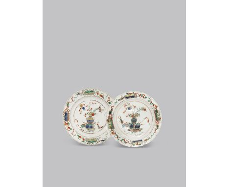 A PAIR OF CHINESE FAMILLE VERTE PLATES KANGXI 1662-1722 Each painted with books, scrolls and a vase with blossoms to the cent