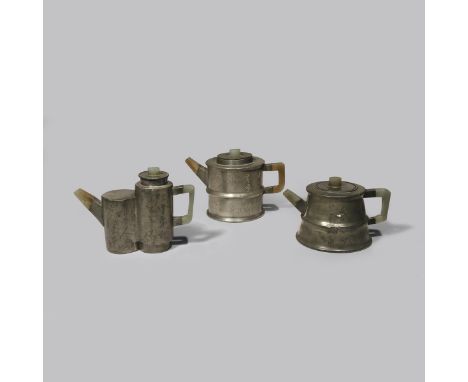 THREE CHINESE INSCRIBED PEWTER-ENCASED YIXING TEAPOTS AND COVERS QING DYNASTY One shaped as conjoined cylinders, two bamboo-s