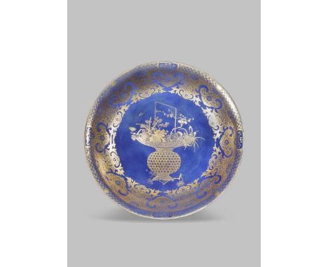 A LARGE CHINESE POWDER BLUE-GROUND DISH 19TH CENTURY Painted in gilt to the centre with a basket of flowers and fruit, bands 