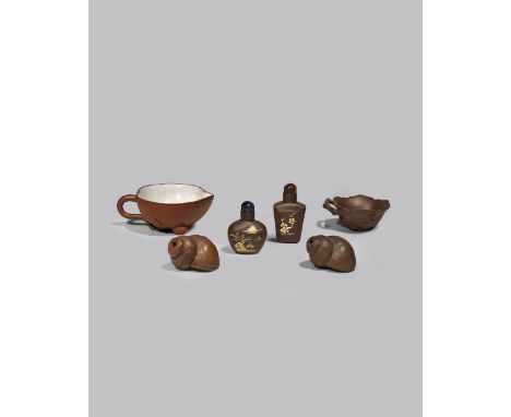 FOUR CHINESE YIXING SNUFF BOTTLES AND TWO CUPS 20TH CENTURY Two bottles shaped as snail shells and two with slip decoration a