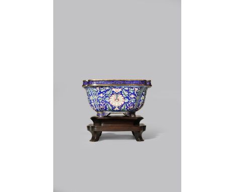 A CHINESE FAMILLE ROSE ENAMEL JARDINIERE 18TH CENTURY The quatrefoil-shaped body painted in coloured enamels and gilt with st