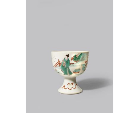 A CHINESE FAMILLE VERTE STEM CUP KANGXI 1662-1722 With a U-shaped body raised on a flared foot, painted with a scholar and an