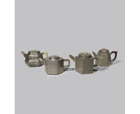 FOUR CHINESE INSCRIBED PEWTER-ENCASED YIXING TEAPOTS AND COVERS QING DYNASTY Three with jade handles, spouts and knops, the e