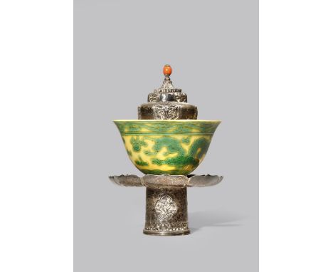 A CHINESE YELLOW-GROUND 'DRAGON' BOWL 19TH CENTURY Incised and enamelled with green dragons and flaming pearls, the base with
