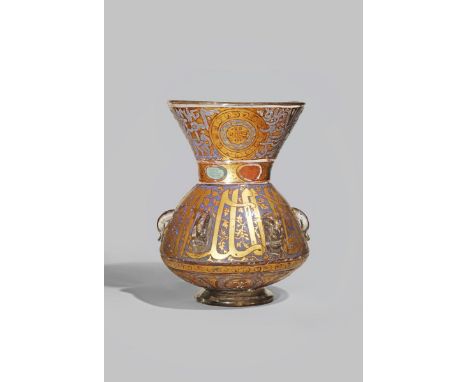 A MAMLUK-STYLE GILDED AND ENAMELLED GLASS MOSQUE LAMP 18TH/19TH CENTURY With a tapering neck decorated with blue calligraphy 