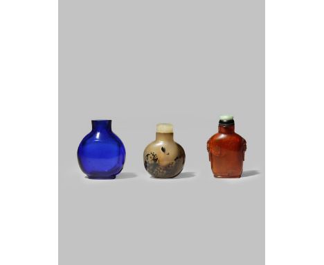 THREE CHINESE SNUFF BOTTLES 19TH CENTURY One agate with a flattened circular body, the stone with black and brown markings, a