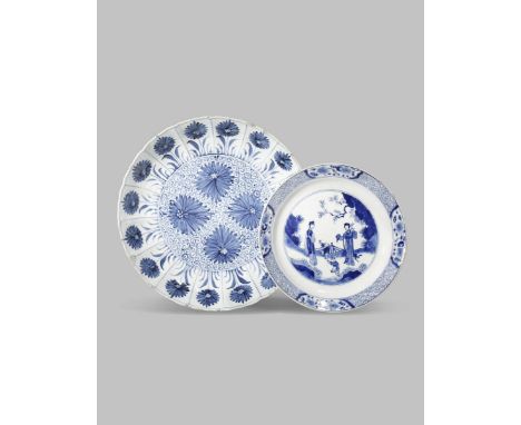 TWO CHINESE BLUE AND WHITE DISHES KANGXI 1662-1722 The larger painted with the aster pattern, the other with two maidens atte