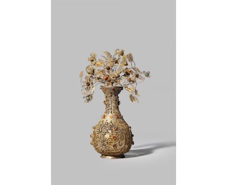 A CHINESE SILVER-GILT FILIGREE VASE 18TH CENTURY With a pear-shaped body decorated with four shou characters, inlaid with bea