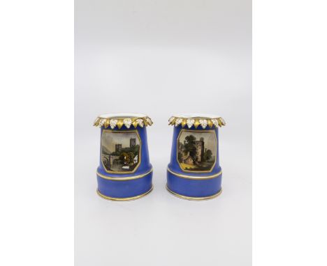 A pair of Royal Crown Derby vases, one with Haddon Hall illustration, the other Worcester Cathedral