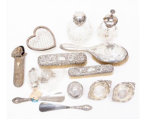 A collection of Victorian and 20th Century silver dressing table ware including: silver mounted etched glass diffuser; a hob 