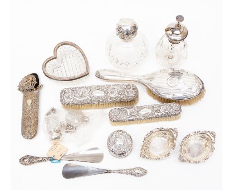 A collection of Victorian and 20th Century silver dressing table ware including: silver mounted etched glass diffuser; a hob 