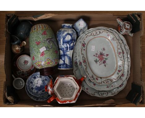 A collection of Asian ceramics including a baluster shaped blue and white vase, Kangxi (restorations); 19th Century sauce dec
