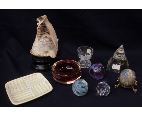 A Whitefriars bubble ruby glass bowl, Alum bay paperweight, Caithness paperweight, 1920's glass inkwell and cover, carved can