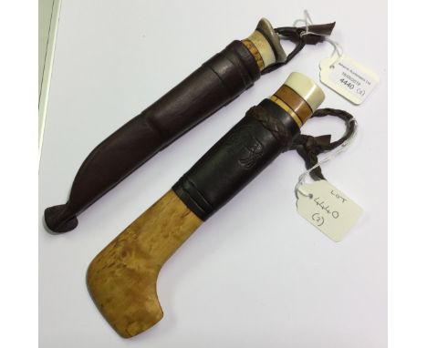 Finnish Puukko hunting knives: The first with single edged 75mm long blade. No makers markings. Wood, horn and brass grip, po
