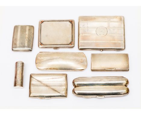 A collection of silver including: a dual cigar holder with gilt interior, Birmingham, 1897; five various engine turned cigare