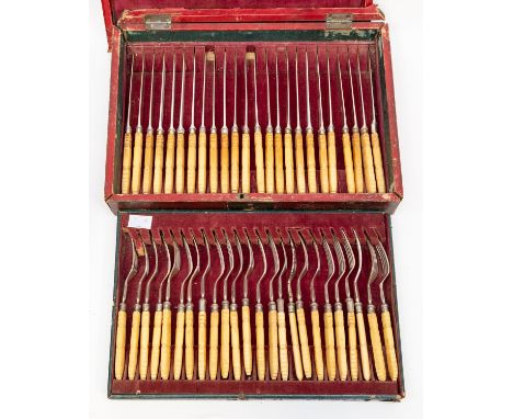 A George IV silver mounted twenty four piece fruit/fish knife and fork set, reeded collars with carved bone handles, Sheffiel