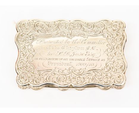 An Edwardian silver snuff box of football interest, inscribed to the top 'Presented by the Committee of the Clapton F.C. to S