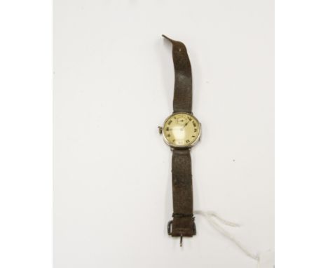 A vintage 1920's silver cased wrist watch, dial diameter approx 30 mm, numerals and subsidiary dial, leather strap