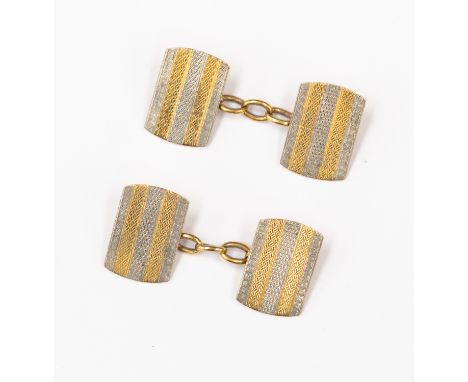 A pair of 18ct gold and platinum cufflinks with engine turned design, rectangular shaped, total gross weight approx 7.5 gms