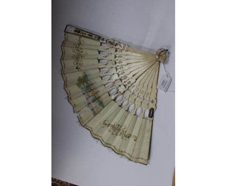 An 18th Century hand-painted and ivory fan, the sticks and guards pierced and gilded, the hand-painted leaf depicting figures