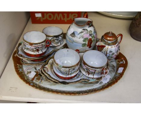 Early 20th Century Japanese tea set on tray, four cups with four saucers, teapot and water jug