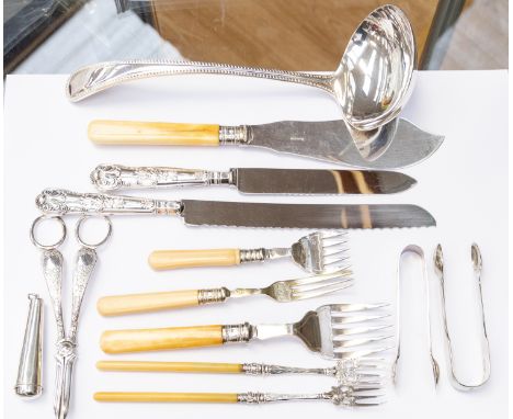 A George V silver cigar holder, Birmingham, 1921 together with a collection of silver plated flatware including soup ladle, s