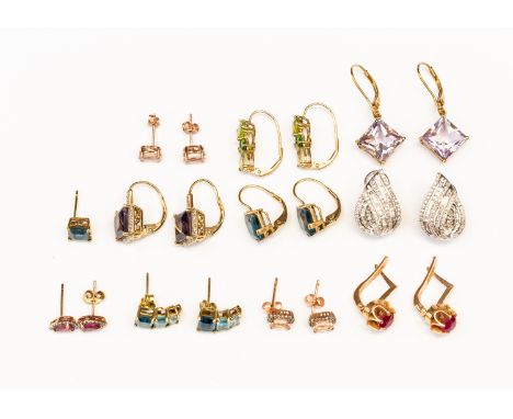 A collection of 10 pairs of earrings to include various fixings, comprising a pair of diamond and 9ct white gold earrings wit