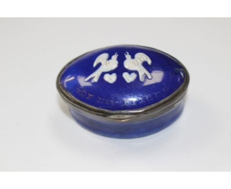 A Bilston cobalt blue enamel snuff box with raised pattern of two love birds in white.
