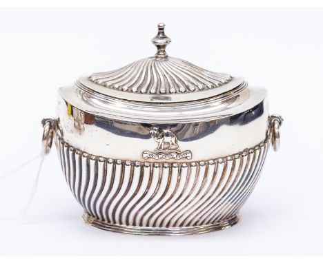 A silver tea caddy