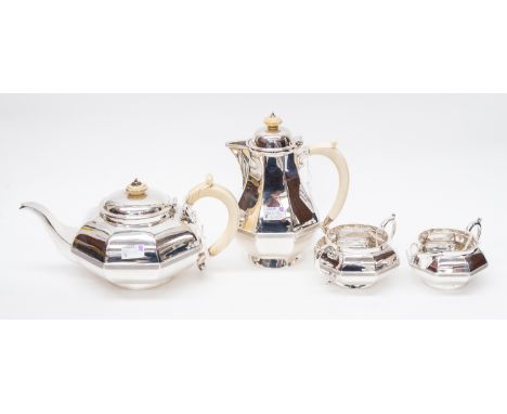 A George VI Jubilee four piece tea service comprising teapot, hot water jug, sugar bowl and milk jug, plain octagonal bodies 