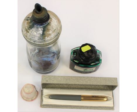 A boxed Parker pen, grey body, 1/10 16k Gold filled, marked "Made in the USA". Along with an Ink bottle, ceramic ink well a/f
