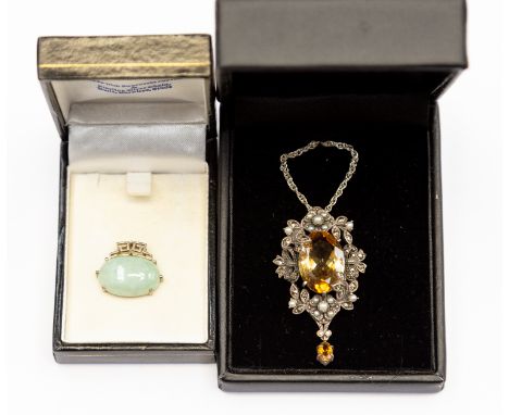 A cabochon crysoberyl set in key pattern silver frame, together with a large citrine, pearl, pendant with silver chain, marca