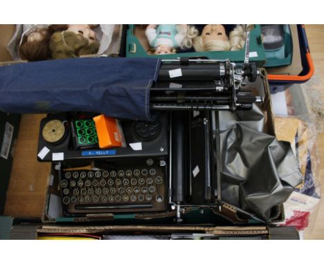 A 1930/40 Imperial typewriter, with two carriages, spare ribbons etc plus cover