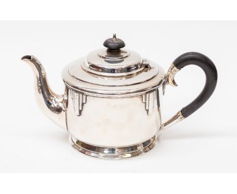 A George VI Walker &amp; Hall sterling silver Art Deco teapot, Sheffield 1937, of cylindrical form, with raised engine turned