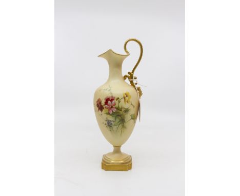 A Royal Worcester blush ivory ewerCondition: Shape number: 1944. Some wear to gilding on base of handle and mask, wear to edg