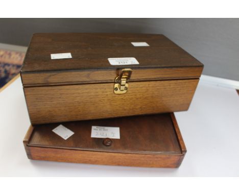 Two sets of chess-men, one travel set, wooden cased (2)