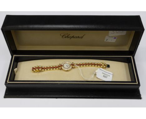 Chopard, a circa 2009 18ct gold lady's Chopard wristwatch 2cm circular mother of pearl dial with diamond set bezel and numera