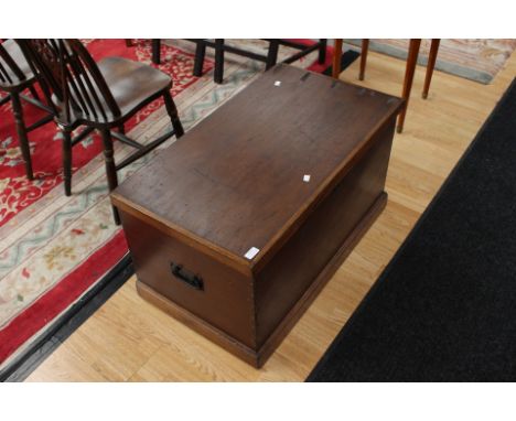 19th Century pine trunk with candle box and two small interior drawers, handles to side