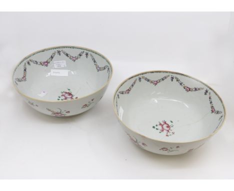 A pair of late 18th Century Chinese export ware famille rose bowls, circa 1780, the exterior friezes painted in polychrome wi