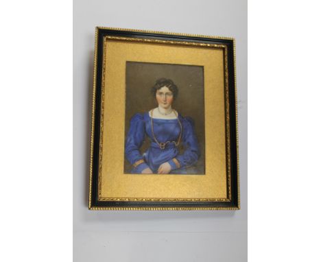 Sir William Charles Ross (British, 1794-1850), portrait miniature of a young lady wearing a blue dress, circa 1824, on ivory,