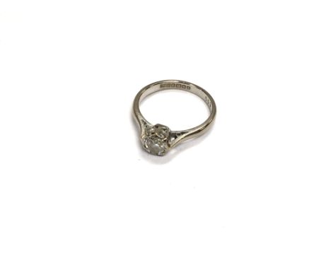 An 18ct white gold 66pts diamond solitaire ring. Approx 2.5 grams, size I.
