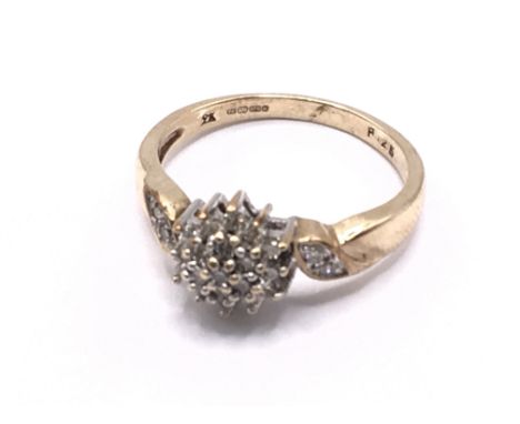 9ct gold diamond cluster ring. Approx 3g. Ring size N. Postage category A.